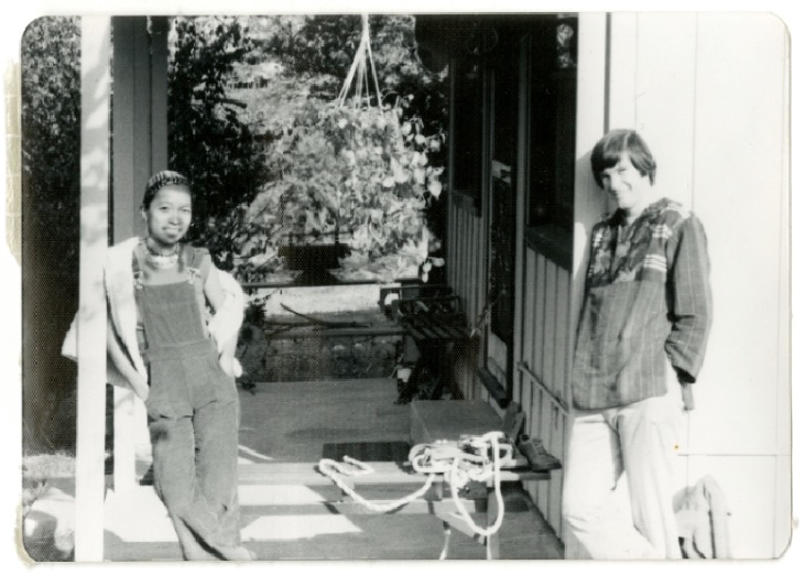 a man and a woman posing for the camera