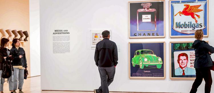 An image of a gallery depicting Warhol works