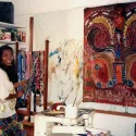 A woman artist and her work in her studio
