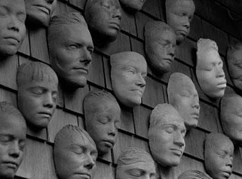 An image of Ruth Asawa's "Untilted (Wall of Masks)"