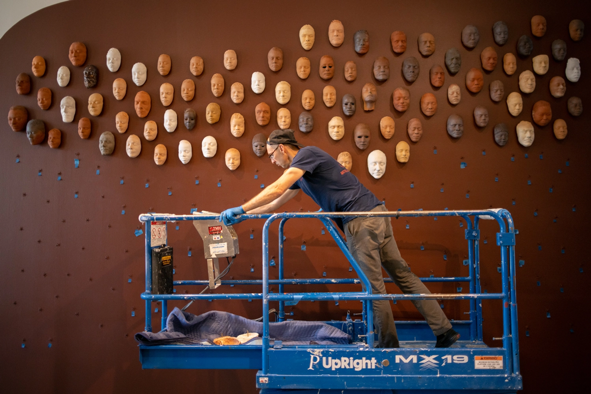 preparator installing exhibition