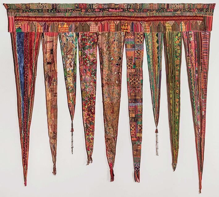 an artwork depicting textiles in the form of flags